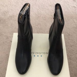 Woman’s black boots by COVINGTON.